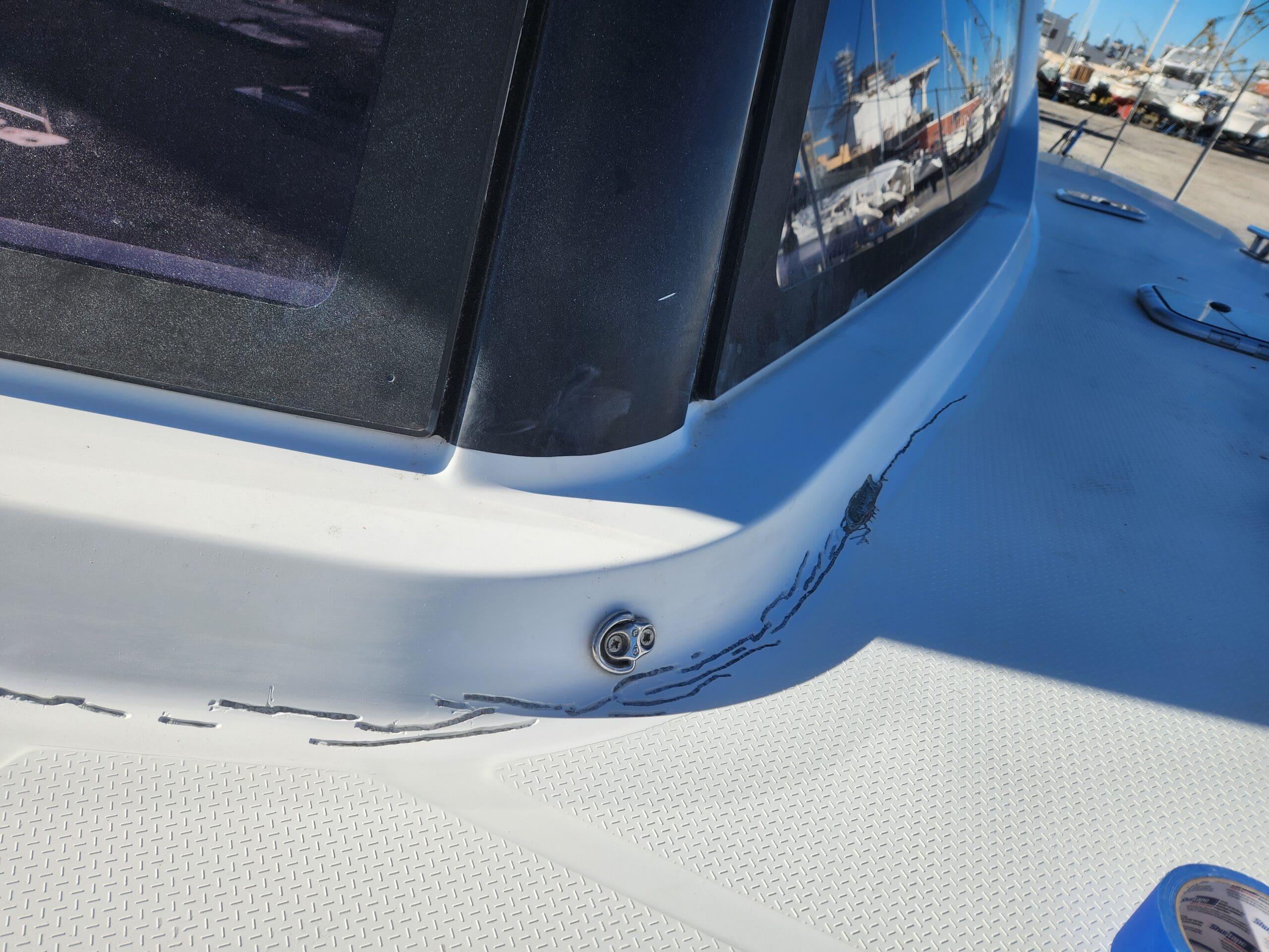 hairline cracks in gelcoat of catamaran